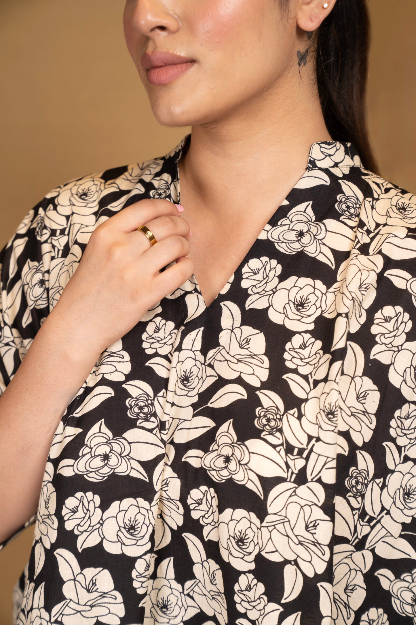 Black and off-white printed floral kaftan top