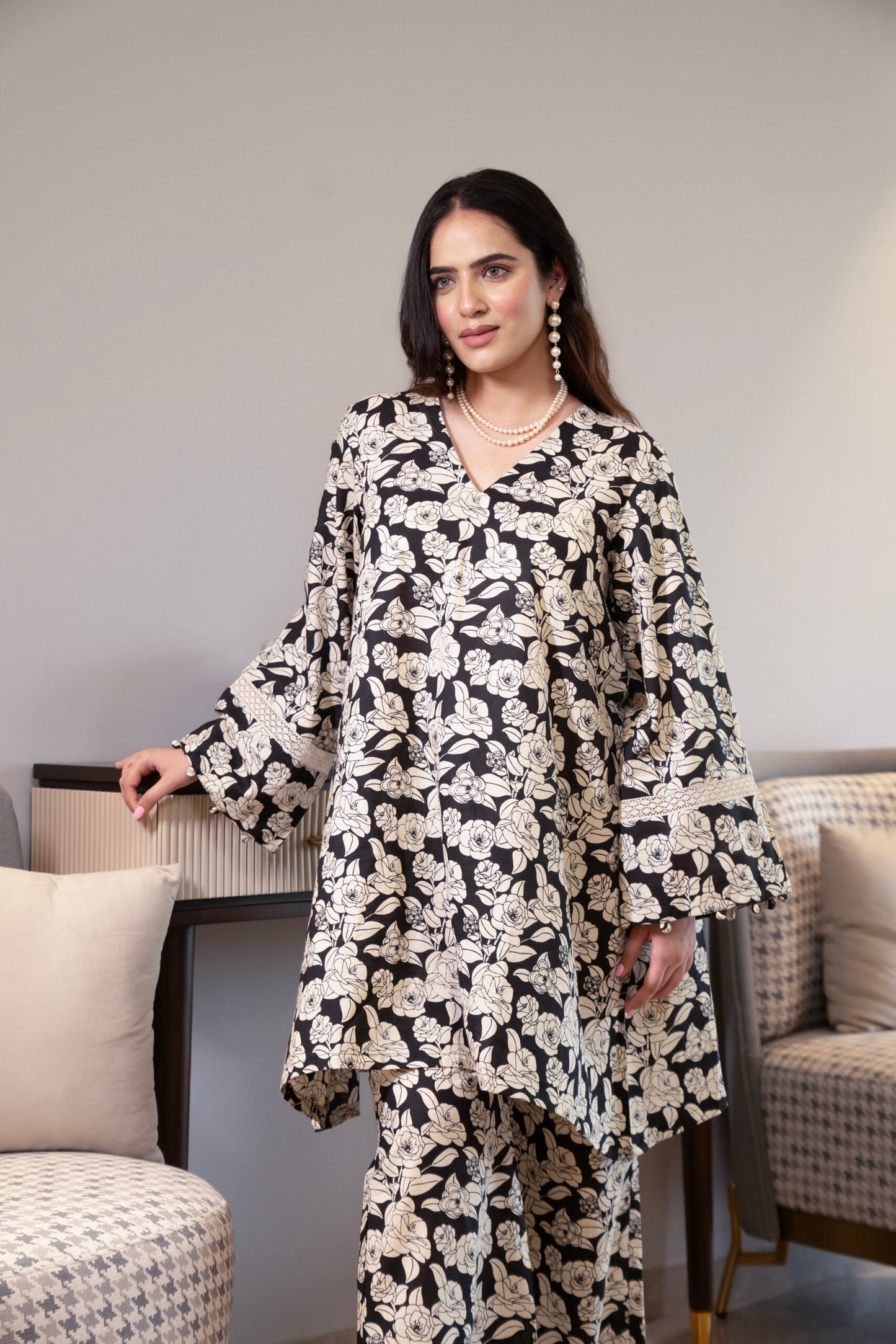 Black and off-white printed floral kurta with flared pants (Co-ord Set)
