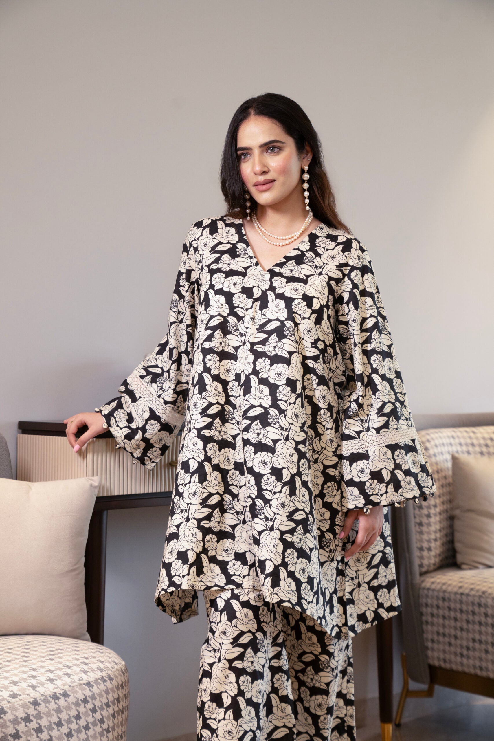 Black and off-white printed floral kurta with flared pants (Co-ord Set)