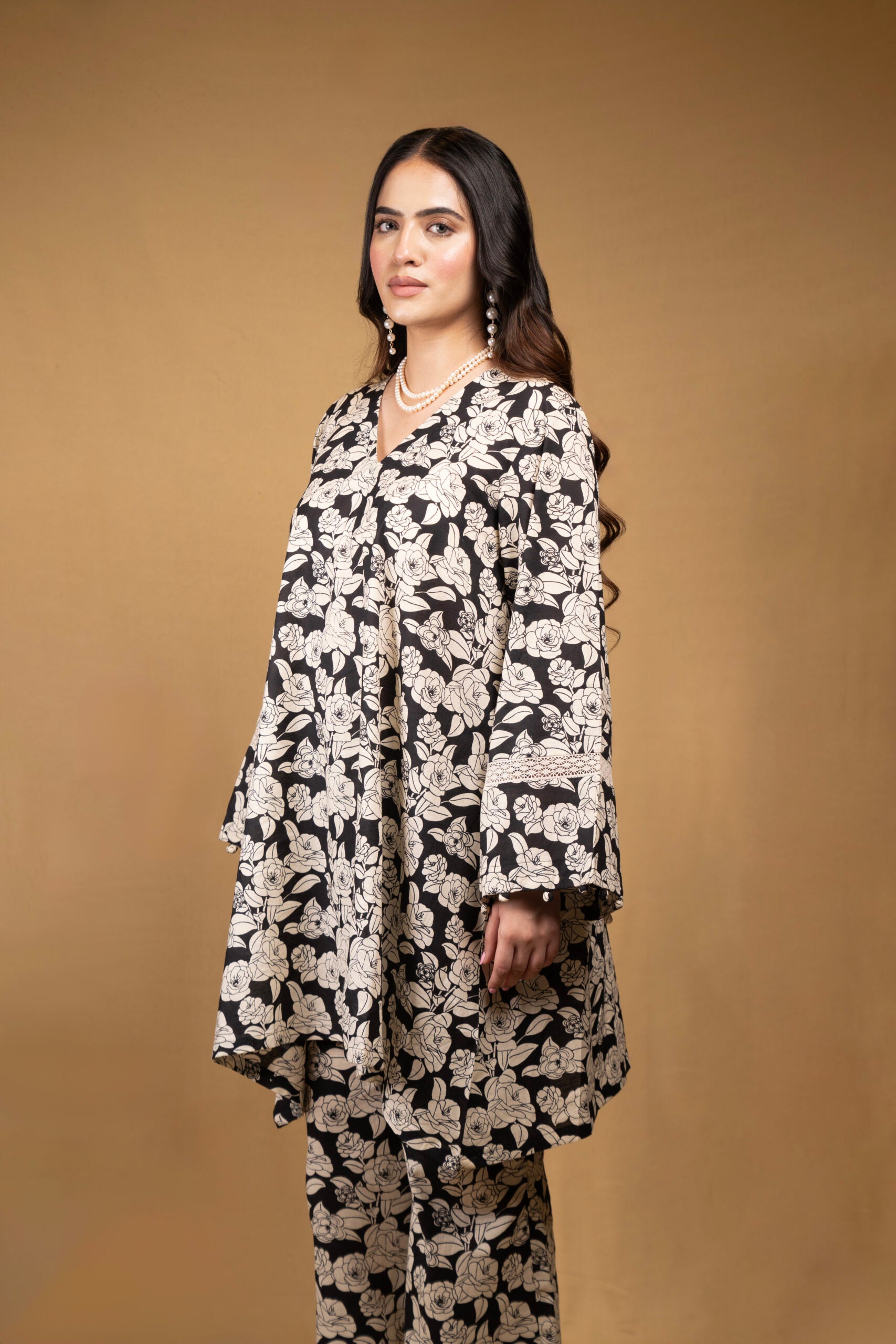 Black and off-white printed floral kurta with flared pants (Co-ord Set)