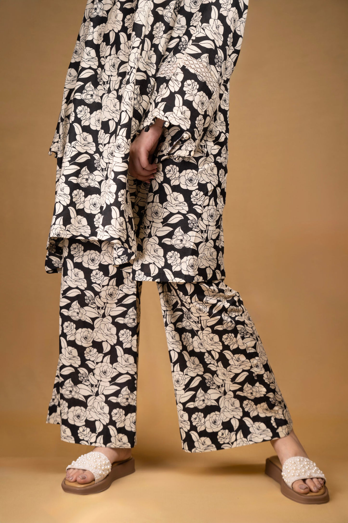Black and off-white printed floral kurta with flared pants (Co-ord Set)
