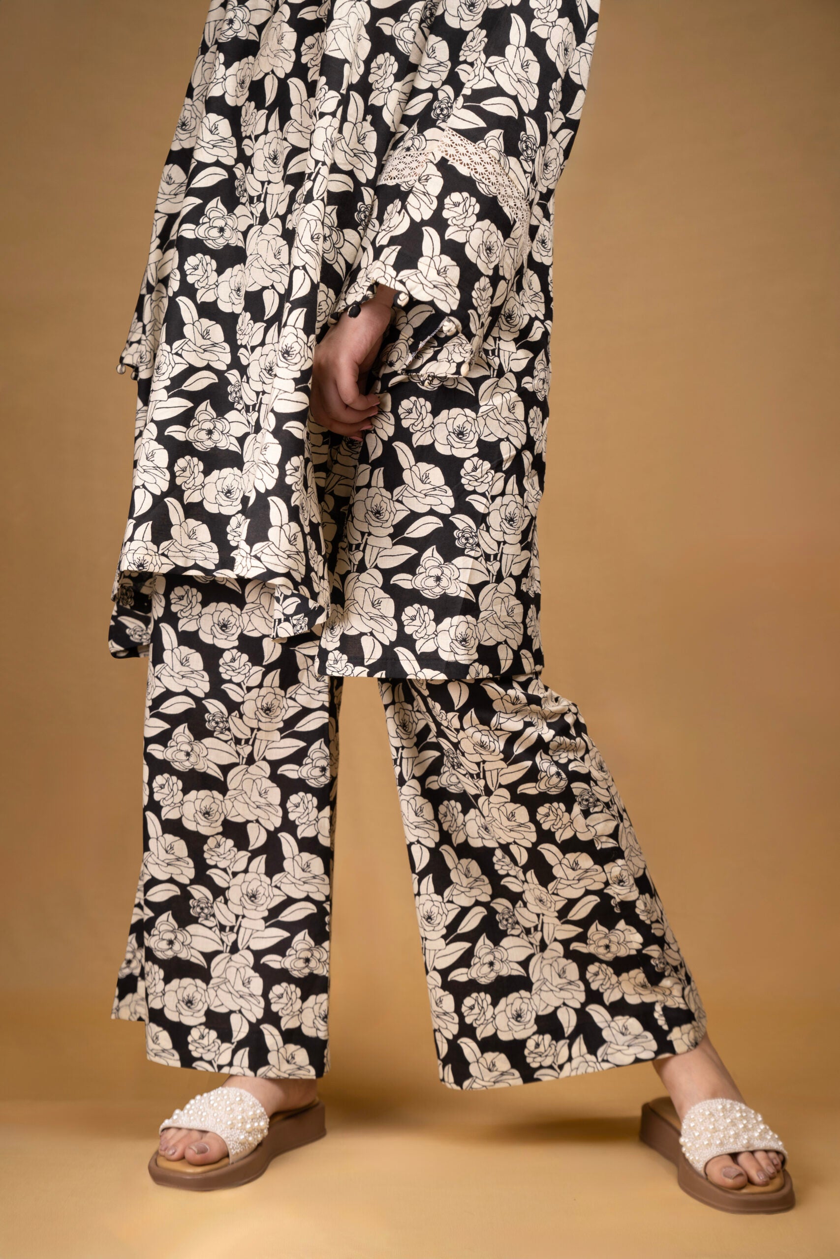 Black and off-white printed floral kurta with flared pants (Co-ord Set)