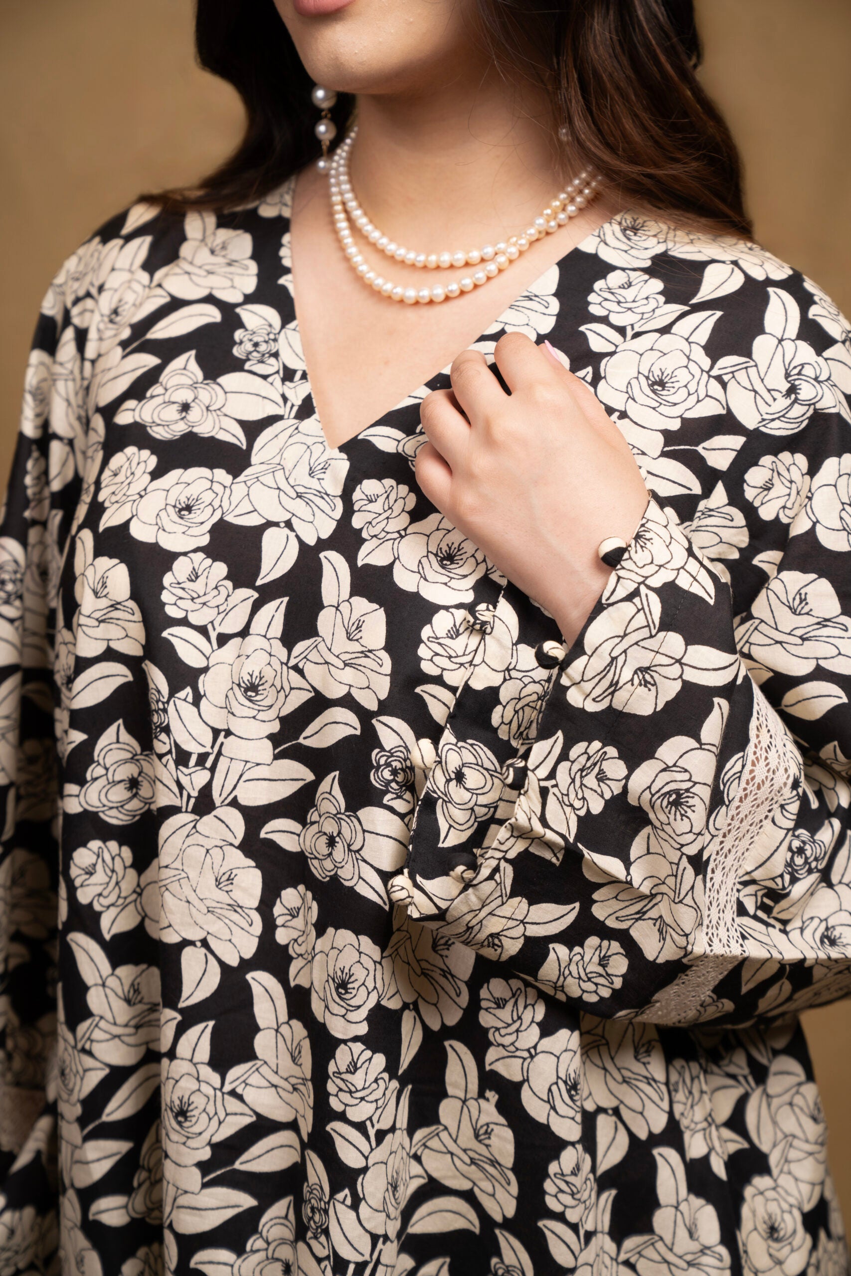 Black and off-white printed floral kurta with flared pants (Co-ord Set)