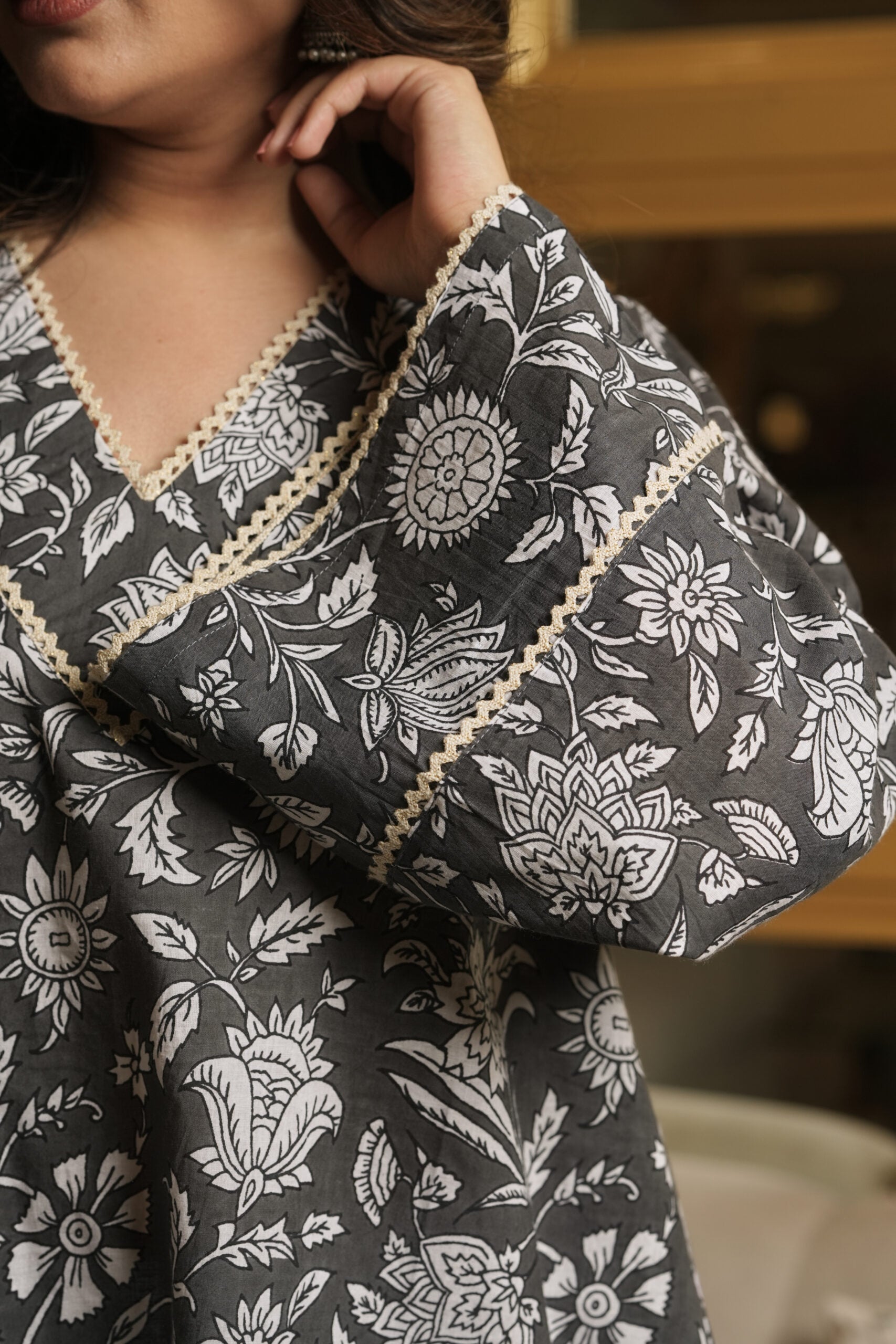 Grey Kurta With Floral Motifs and Flared White Pants (Set of 2)