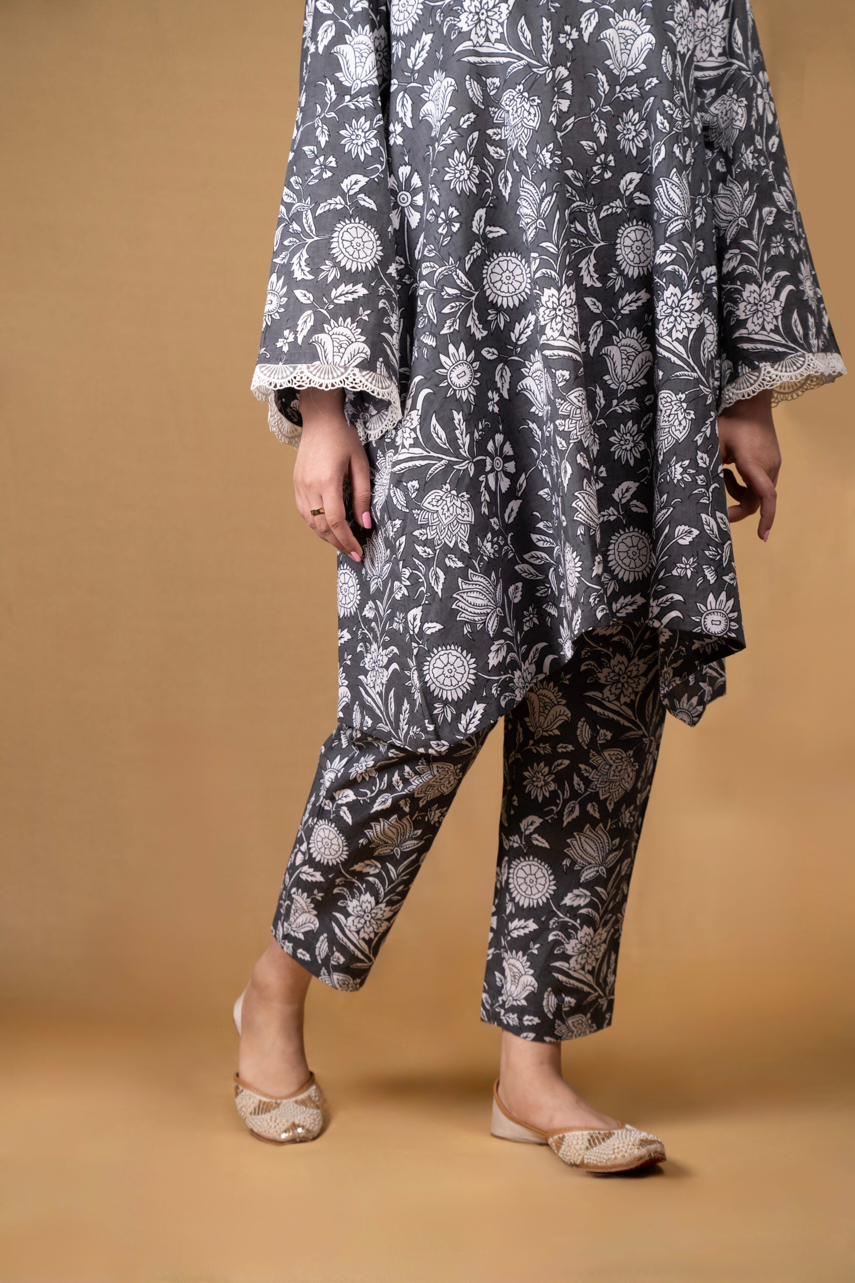 Grey flared kurta with floral motifs and straight pants (Co-ord Set)