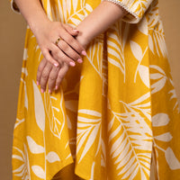 Yellow botanical print asymmetrical kurta with straight pants (Co-ord set)